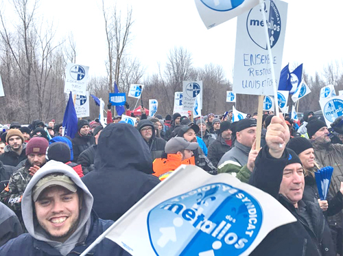 Unionists at ABI smelter in Bécancour, Quebec, hold mass picket Jan. 12, day after ABI locked out 1,000 workers. Bosses were turned back after half an hour trying to get into plant.