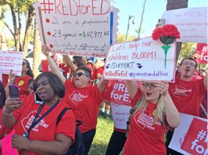 Thousands march in Phoenix and across Arizona March 28 against attacks on teachers.