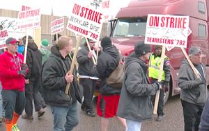 Teamsters Local 792 members on strike against beer distributor J.J. Taylor in Minneapolis picket April 12. Company demand to eliminate two-person truck crew threatens workers’ safety.