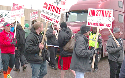 Teamsters Local 792 members on strike against beer distributor J.J. Taylor in Minneapolis picket April 12. Company demand to eliminate two-person truck crew threatens workers’ safety.