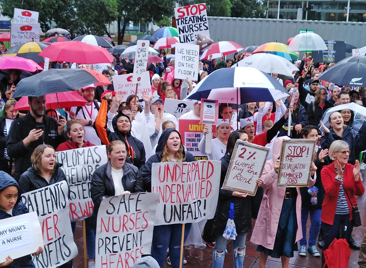 Nurses, hospital workers rally in Auckland, New Zealand, May 12, part of nationwide day of protests against low pay, understaffing, worsening conditions for both workers and patients.
