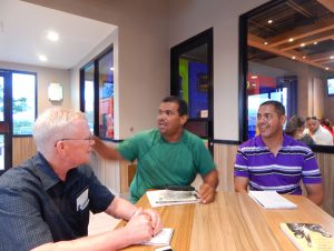 Above, fisherman Luis Velázquez, center, describes what fishermen face from government neglect after Hurricane Maria destroyed their dock to Lenis Rodríguez, right, leader of Yabucoa Support Group, and John Studer, editor of the Militant.