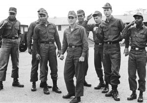 Washington was shaken by spread of mass opposition to Vietnam War “not just among students and millions of workers but increasingly the ranks of the U.S. draftee army,” says Waters. Above, Fort Jackson Eight, GIs who fought effort to court martial them in 1969 for speaking out against the war. Below, Vietnamese liberation fighters, April 1975, celebrate atop captured U.S. tank after victory over decades-long U.S. imperialist intervention.