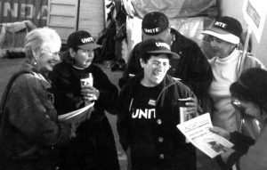 Above, Wendy Lyons, left, joins picket line of UNITE strikers at Hollander Home Fashions in Los Angeles, March 2001. Inset, Lyons being interviewed by Chinese-language TV, December 2004, during her campaign as Socialist Workers Party candidate for mayor of Los Angeles.
