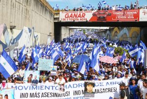 Movement of Mothers of April lead march on Mother’s Day, May 30, in Managua, Nicaragua, honoring those killed and wounded by government thugs during April demonstration. Banner reads “No more assassinations! No more massacres!” Nearly 300 people have been killed.