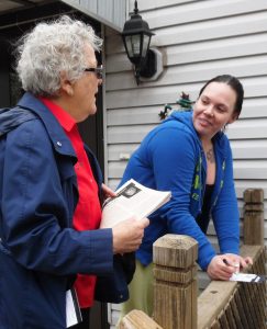Helen Meyers, left, SWP U.S. Senate candidate in Minnesota, talks with workers going door to door in Maplewood May 12.