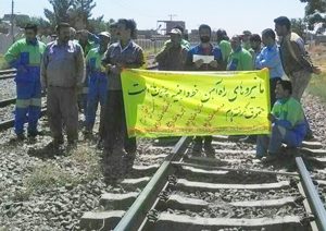 Track workers in Iran Aug. 7 protest effects of rulers’ counterrevolutionary wars.