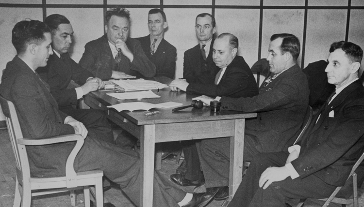 Above, Carl Skoglund, at head of table, in leadership meeting of Teamsters Local 544, November 1937. “Skogie” was communist, revolutionary fighter and labor militant all his life. Inset, Skoglund, left, with SWP leader James P. Cannon, 1949.