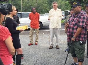 Marion Payne, fired DeKalb County, Georgia, school bus driver, speaks at July 20 press conference. Payne is one of several drivers fired after drivers got sick over pay and work conditions.