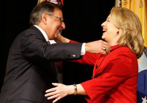 Ex-CIA head Leon Panetta greets Hillary Clinton, 2013. Panetta and group of ex-spy chiefs defend ex-CIA head John Brennan, who lost his security clearance after calling President Donald Trump "treasonous." In drive to bring down Trump, liberals build up the rulers' spy agencies.
