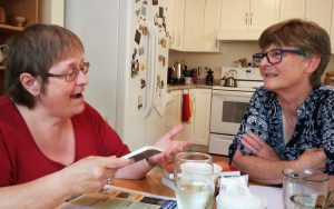 Militant subscriber Laurie McClarty, left, invited Communist League members over Aug. 29 to discuss capitalism’s wars. Right, Katy LeRougetel, CL candidate for Vancouver mayor.