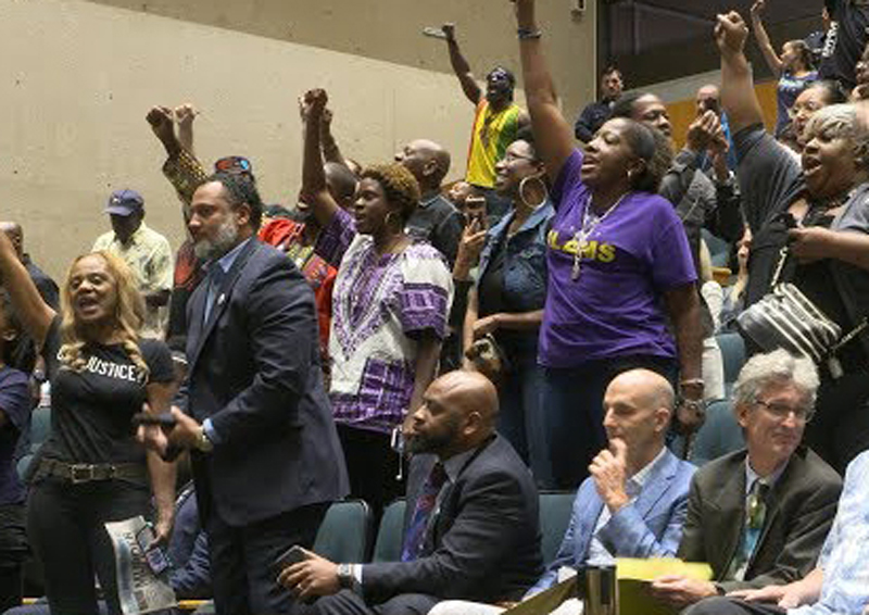 Protesters attend Dallas City Council hearing Sept. 12, demanding Dallas cop Amber Guyger be fired, jailed for shooting and killing of Botham Jean, 26, in his own apartment.
