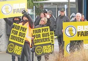Bus drivers, members of FIRST Union, carried out one-day strike against Go Bus. They picketed transport center in Hamilton, New Zealand, Aug. 14, demanding equal pay for same work.