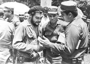 From left, Ernesto Che Guevara, Alfonso Zayas, Rogelio Acevedo, at 1964 reunion of combatants in Rebel Army column led by Guevara. “The Rebel Army was a political vanguard organization that was painstakingly selected and tested in battle,” Mary-Alice Waters writes. “As the revolutionary war advanced, these cadres became more educated and more politically homogeneous.”