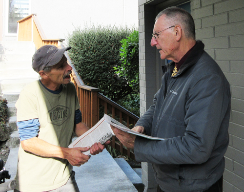 Edwin Fruit, right, SWP candidate for U.S. Senate in Washington state, talks with former fishing boat deckhand and current hospital worker Mitchell Coleman in West Seattle, Oct. 20. Coleman said he’s been thinking a lot about how to strengthen the union at work, but that many co-workers fear retaliation by the company. We need to build the union movement, Fruit said, and workers need our own political party. Coleman got a subscription to the Militant.