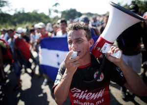 Honduran and other Central Americans march through Mexico Oct. 21 on way to U.S. border. Honduran toilers face crisis of both imperialist pillage and exploitation from native capitalists.