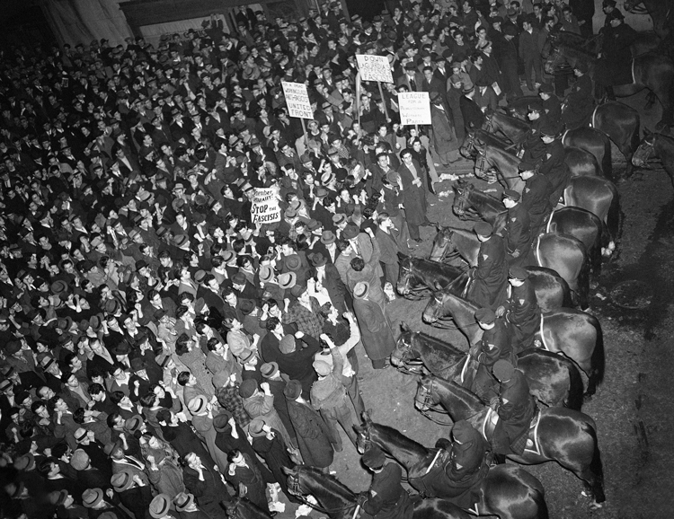 A meeting by fascist German American Bund at Madison Square Garden on Feb. 20, 1939, was met by a demonstration of 50,000, above, initiated by the Socialist Workers Party and backed by unions and others. There is no similar rise in fascist gangs and anti-Semitism today. Combating Jew-hatred is a life or death question for the working class and labor movement.