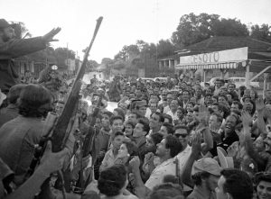 People in Colón, Cuba, greet Fidel Castro, above left, Jan. 7, 1959, as “Liberty Caravan” went to Havana. Castro led Rebel Army, Cuban workers and farmers to victory, then led millions to carry out, defend socialist revolution.