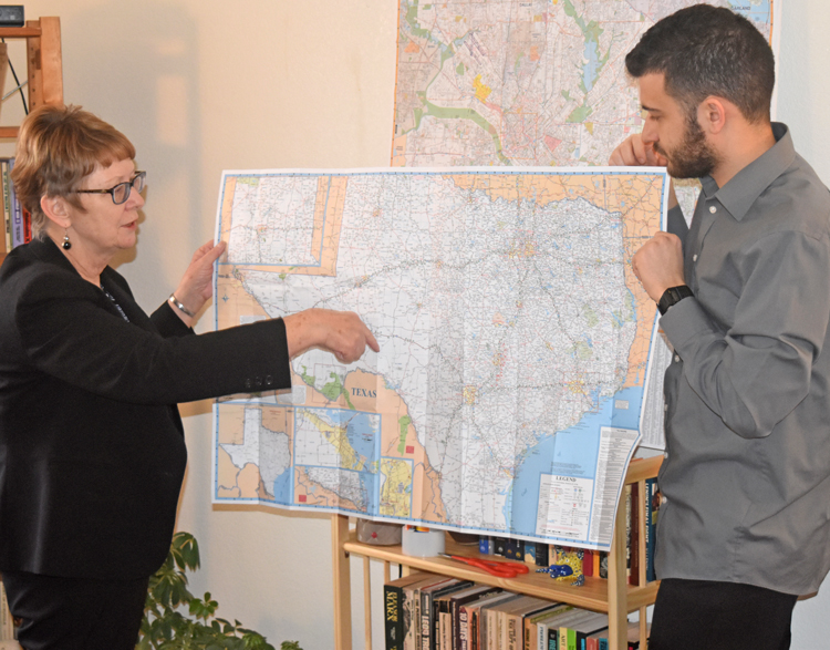 Alyson Kennedy, SWP candidate for Dallas mayor, and campaign supporter Samir Hazboun show on maps where they will campaign around the state as they also get on ballot in Dallas.