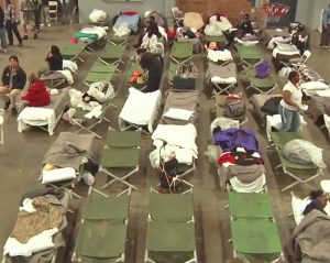 Homeless shelter in Los Angeles. California’s homeless population rose 13.7 percent from 2016 to 2017, as high rents and low wages drive hundreds of thousands of working people into shelters or to live on the street. Last year families made up one-third of total homeless population.