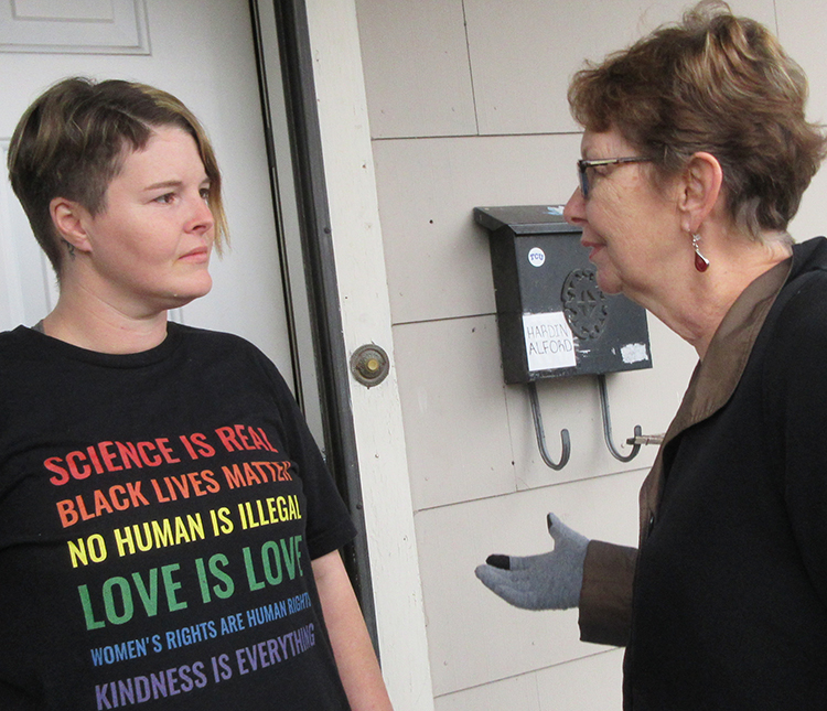 Kelly Alford in East Dallas said she wanted to help petition to get Alyson Kennedy, right, SWP candidate for Dallas mayor, on the ballot, and to consider joining the May Day brigade to Cuba.