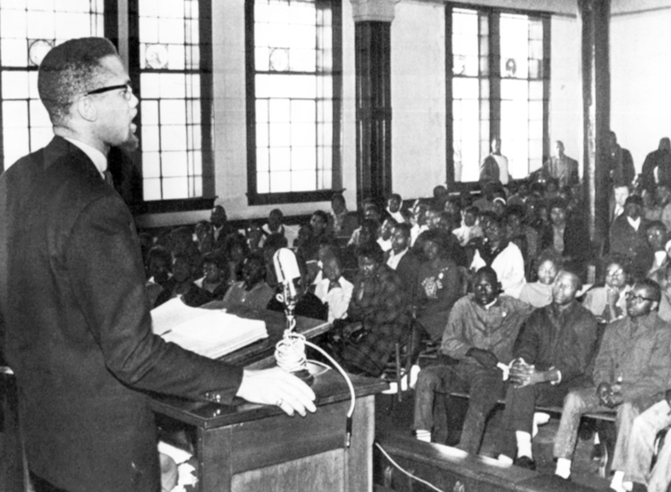 Malcolm X speaks to young civil rights fighters in Selma, Alabama, Feb. 4, 1965. In last weeks of his life, Malcolm spoke increasingly as a revolutionary leader of the entire working class.