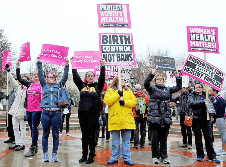 Protesters at University of Missouri demonstrate in 2015 in support of women’s right to abortion, demanding university hospital executives reverse decision to cut off admitting privileges for doctors who perform abortions at Planned Parenthood clinic in Columbia, Missouri.