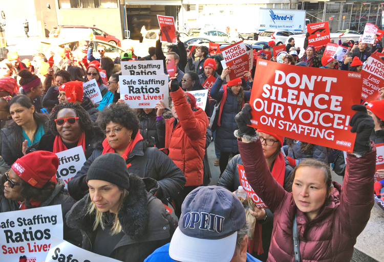 Hundreds of nurses rally March 18 at Mount Sinai Hospital, as New York nurses fight for new contract at major hospitals in city. Demands include more nurses to provide care.