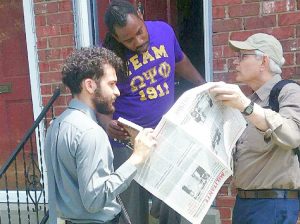 Samir Hazboun, left, SWP candidate for Kentucky lieutenant governor, and Ned Measel, right, talk with Ibn Green in Louisville May 11. Campaign supporters ask readers to join in stepped-up effort to meet goals for subscriptions, books and Militant Fighting Fund in full by May 28.