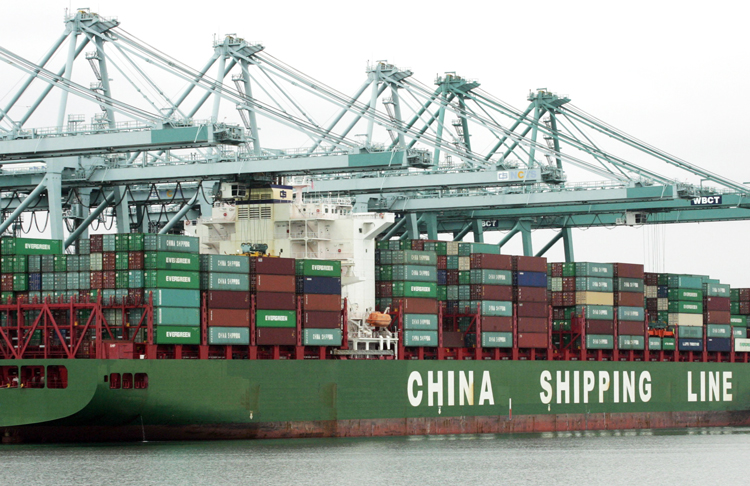 Container ship loaded with goods from China berths at Port of Los Angeles in 2011. U.S. rulers are using Huawei ban and tariffs on greater volume of imports from China as leverage against Beijing in trade talks. Competing rulers seek deal that best defends their capitalist interests.