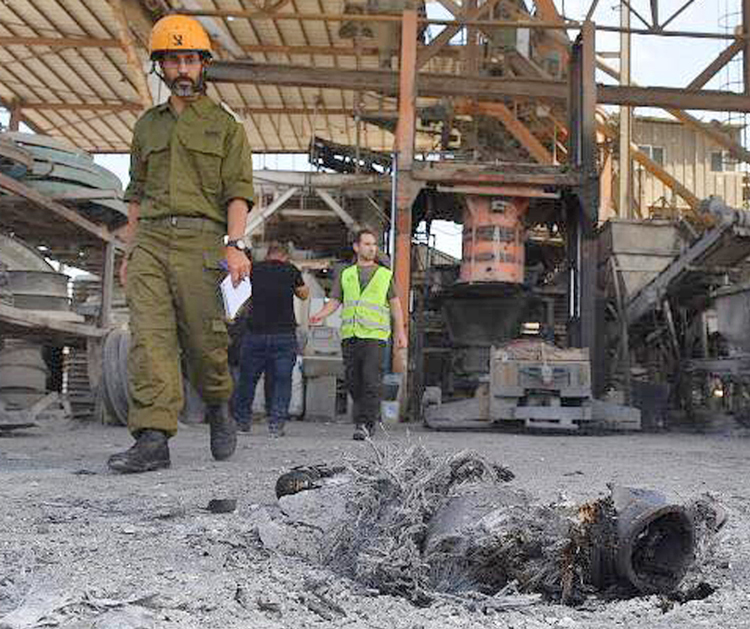 Cement factory in Ashkelon, southern Israel, struck by missiles May 5. Three Israelis were killed in the attack, including a Bedouin worker at the factory. Deadly barrage launched by Tehran-backed Hamas and Islamic Jihad and brutal retaliation from Tel Aviv highlight necessity of immediate talks to recognize both Israel and an independent Palestinian state.