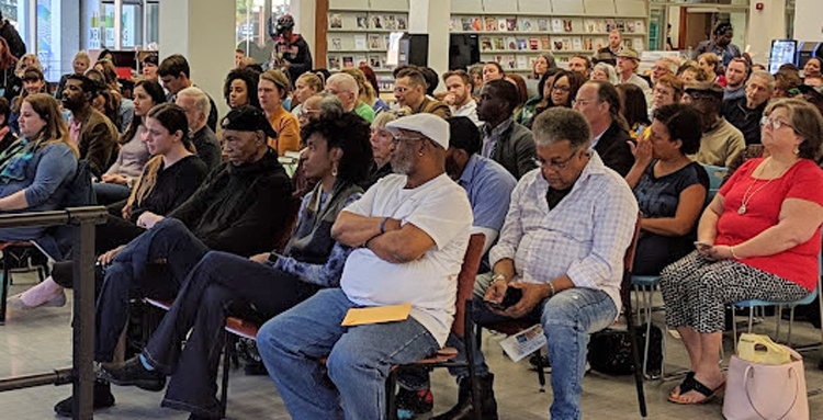 Militant   is appealing Florida prison ban on two issues of paper, including issue at left with article on tour of Albert Woodfox, who spent nearly 44 years in solitary confinement. Above, New Orleans Public Library meeting to hear Woodfox, March 20.