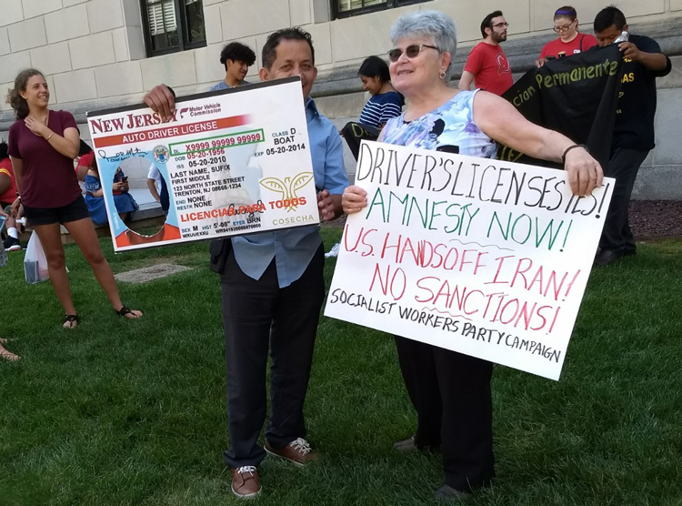 Lea Sherman, SWP candidate for New Jersey General Assembly, and Francisco Molina with driver’s license placard at protest for licenses for immigrants in Trenton, New Jersey, June 27.