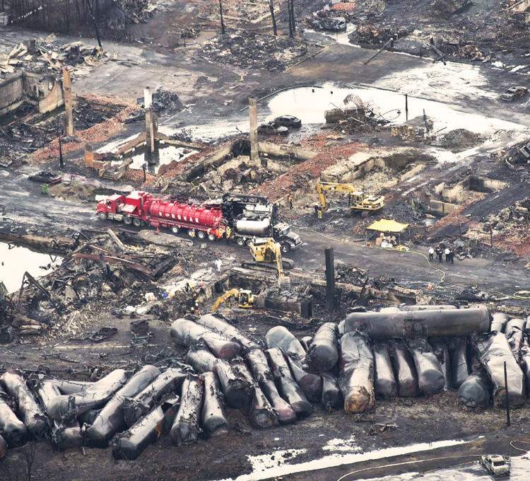 Bosses drive to boost profits led to train derailment in Lac-Megantic, Quebec, in July 2013, killing 47 people. Rail coalition there sent solidarity message to people of East Palestine, Ohio.