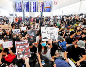 Demonstrators at Hong Kong airport shut down all flights Aug. 12-13. Hundreds of thousands of working people have been protesting over 10 weeks. Demands include direct elections.