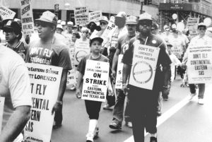 Eastern Airlines strikers and supporters march in New York, September 1989. In efforts to oust President Trump, Times is rewriting history to place the question of ‘racism’ at the center of all politics, obscuring common interests of working people of all nationalities.