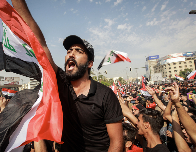 Protesters in Baghdad Oct. 1, one of many actions across southern Iraq. Working people have used opening of political space with the defeat of Islamic State to press demands for jobs, services, for the fall of the government and for Tehran’s hated militias to leave the country.