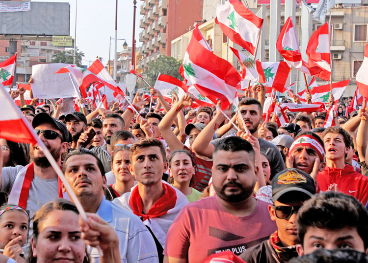 Oct. 22 protest in Tripoli, Lebanon. Beginning to overcome sectarian and religious divisions, thousands have been protesting across the country against government’s “austerity” assault.