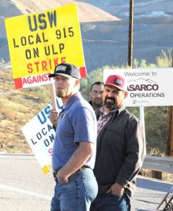 Copper workers picket outside Asarco Ray mine in Kearny, Arizona, Oct. 14. 