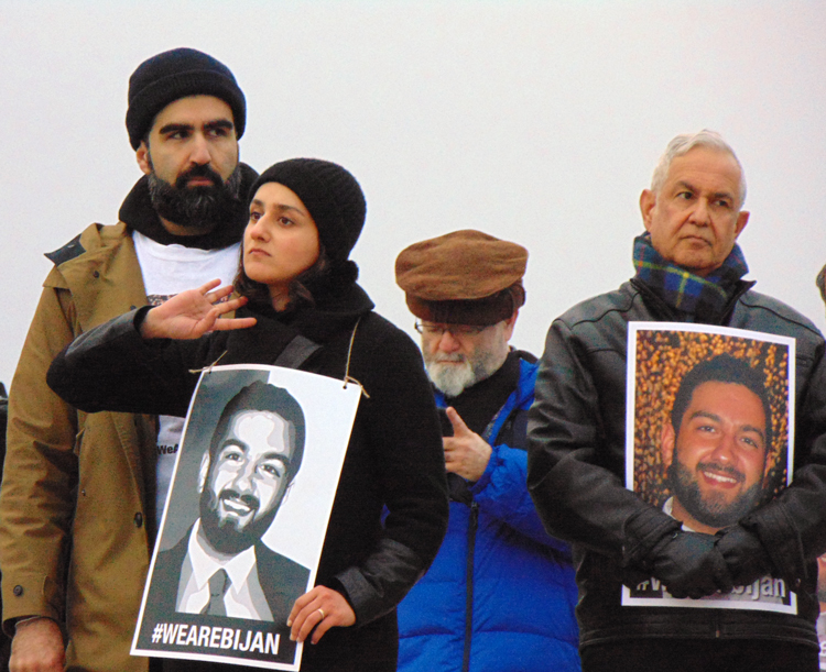 Nov. 17 protest at Lincoln Memorial demanding prosecution of cops who killed Bijan Ghaisar. At left is his sister, Negeen Ghaisar, with her husband. At right is his father, James Ghaisar.