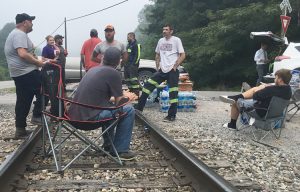Miners block rails, Harlan County, Kentucky, July 2019, to stop Blackjewel bosses from hauling coal until wages owed them were paid. The nonunion miners won broad support and, in October, their back pay.