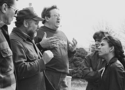 Cuban youth leader Kenia Serrano, right, on U.S. speaking tour, listens to UAW pickets on strike at Caterpillar plant in York, Pennsylvania, March 1995, explain their fight. Strikers also welcomed learning from Serrano about the Cuban Revolution. 