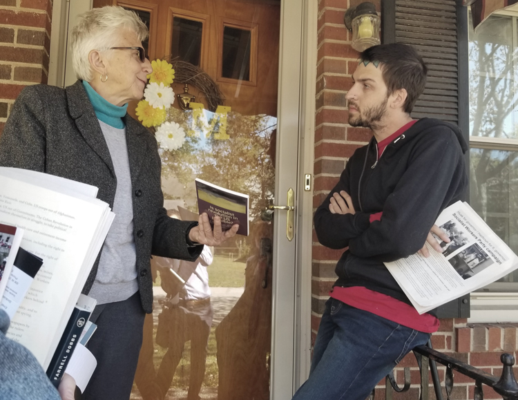 SWP member Maggie Trowe talks with GM striker Kenneth Matczak at his doorstep in Bowling Green, Kentucky, Oct. 18. “We’re trying to raise the standard for all workers,” he said about their walkout. He got a Militant subscription and Is Socialist Revolution in the US Possible?