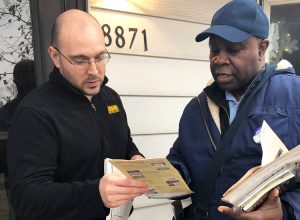 SWP member Leroy Watson, right, talks to Joshoa Gantile on his doorstep in Hometown, Illinois, Dec. 8. SWP says workers need to build a labor party to defend our class interests.