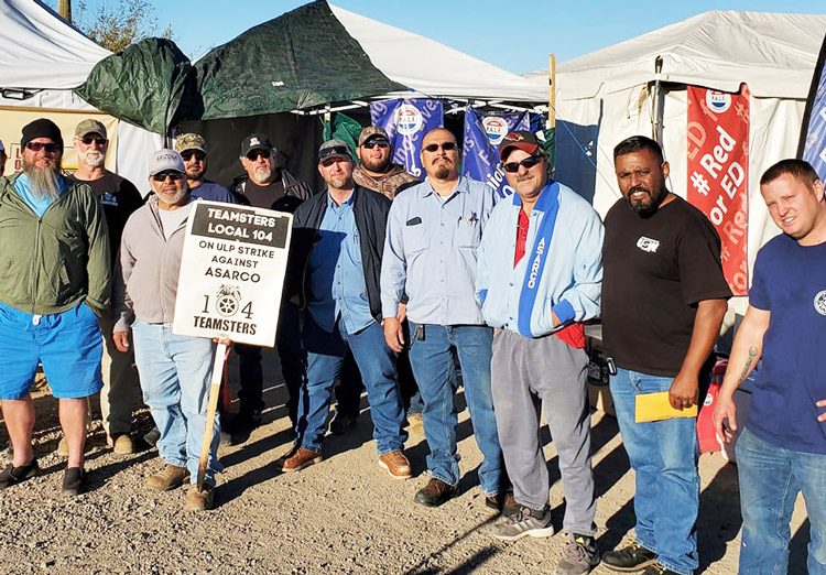 Members of Machinists Local 933 from Raytheon missile plant in Tucson brought donations to Asarco picket line at Mission Mine Dec. 20. Copper miners strike began Oct. 13.