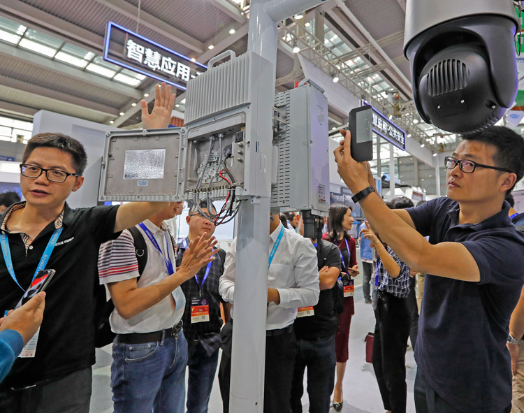 Huawei display of 5G mobile station at China Expo in Shenzhen, Oct. 29, 2019. Beijing seeks to use high-tech dominance to help establish long-term bloc with reliant Asian regimes.