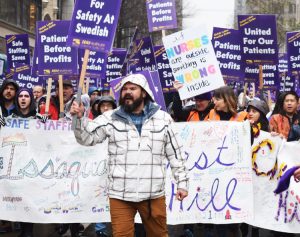 Members of SEIU Healthcare 1199NW rally in Seattle Jan. 29 during three-day walkout at Swedish-Providence hospitals demanding increased staffing for patient care and a wage raise.