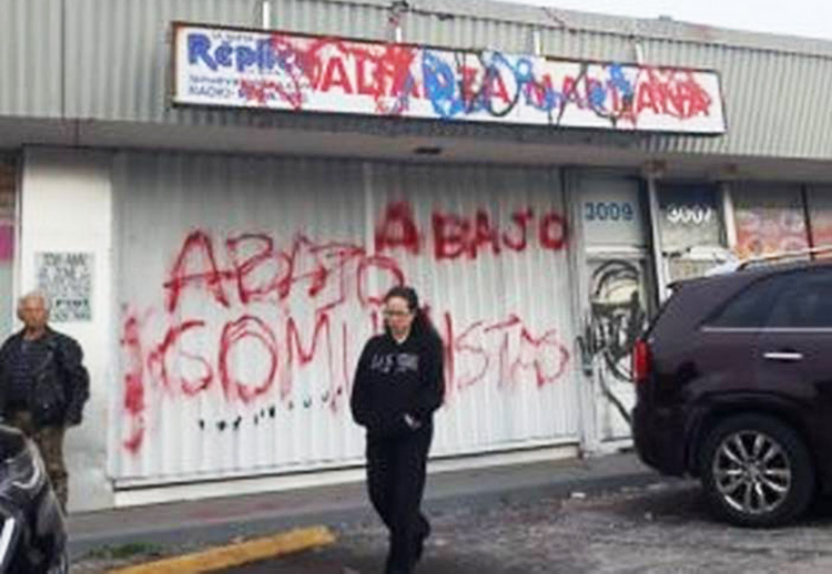 Storefront of Alianza Martiana, a Miami organization that defends the Cuban Revolution, after attack by rightists Jan. 26. Vandals painted threat, “Abajo comunistas” (Down with communists).