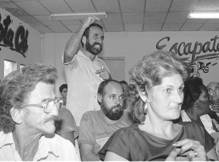 As part of carrying out their revolution, Cuban workers took control of production in the factories and on the land. Above, workers at Havana dairy factory meet in 1994, joining the national debate over how to reorganize production to address shortages in Cuban economy.