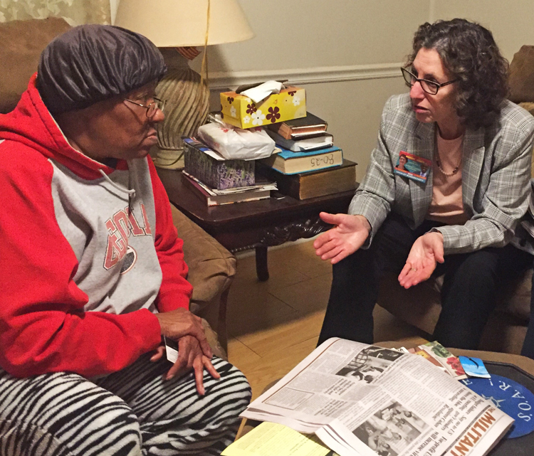 Rachele Fruit, right, SWP candidate for U.S. Senate from Georgia, speaks with Judy Sands March 7 at her home in Juliette, where the power company has contaminated the drinking water.